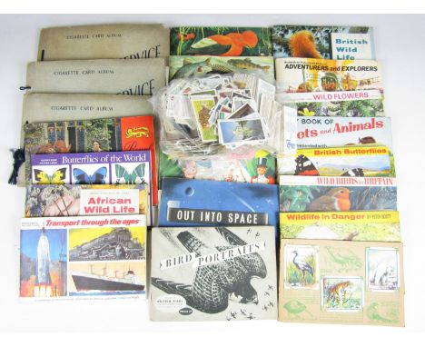Three Senior Service cigarette card albums together with sundry tea card albums etc.
