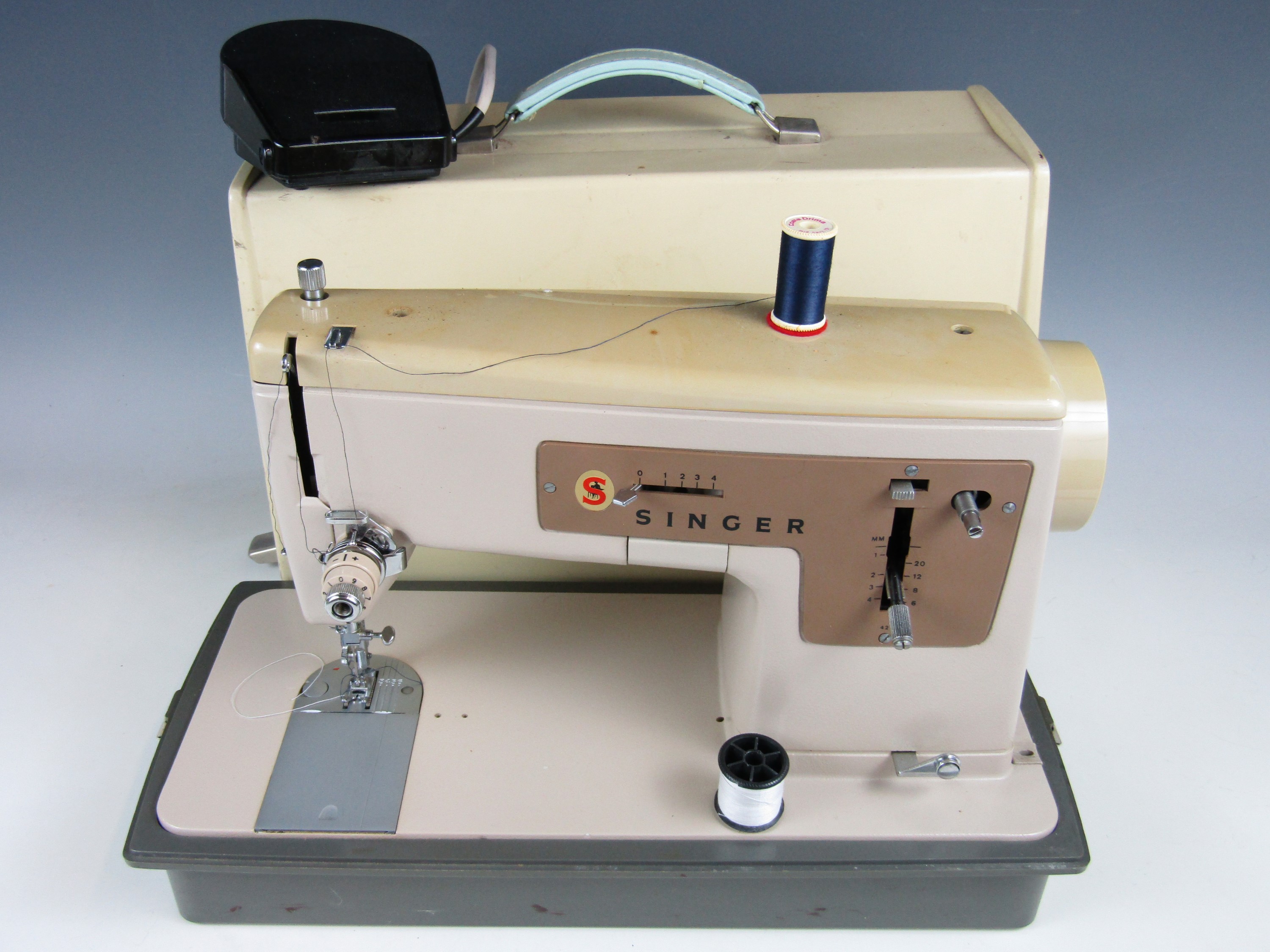 A vintage Singer electric sewing machine