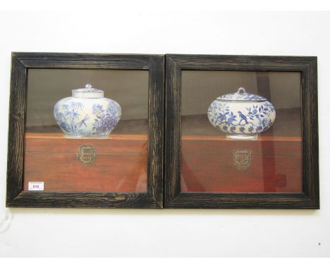 After Arnie R Fisk (20th Century) A pair of fine art prints depicting blue and white porcelain perched on top of a wooden che