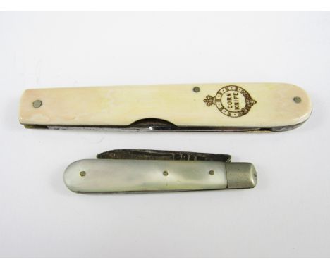 A William Rogers corn knife, together with a silver folding fruit knife with mother of pearl grip scales