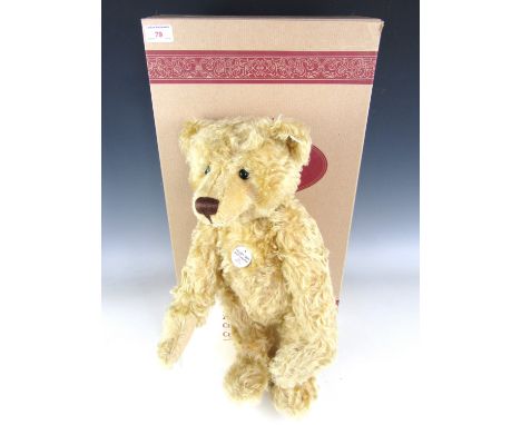 A Steiff 1905 Boy Teddy bear in blonde mohair with original carton and tags