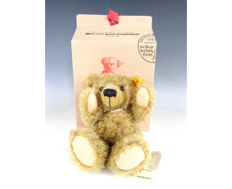 A Steiff Classic Teddy bear in blonde mohair with original carton and tags