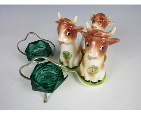 A novelty Hummel cruet set in the form of Jersey cows (a/f) together with a pair of glass salts