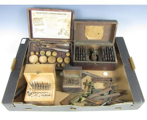 A large quantity of vintage watchmakers' tools including burrs etc.