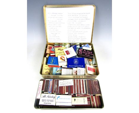 A large collection of vintage match boxes and match books