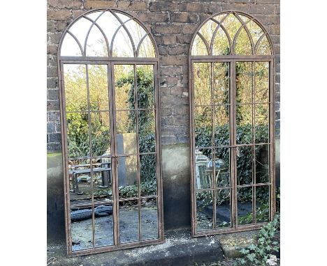 ARCHITECTURAL GARDEN MIRRORS, a pair, gated design, 180cm x 75cm. (2) 