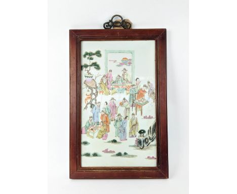 CHINESE FAMILLE ROSE CERAMIC PLAQUE, 50.5cm x 33cm W, 19th century, depicting figures in a garden setting, wooden frame surro