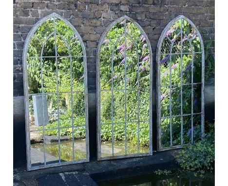 ARCHITECTURAL GARDEN WALL MIRRORS, a set of 3, aged painted metal frames, 160cm x 67cm. (3) 
