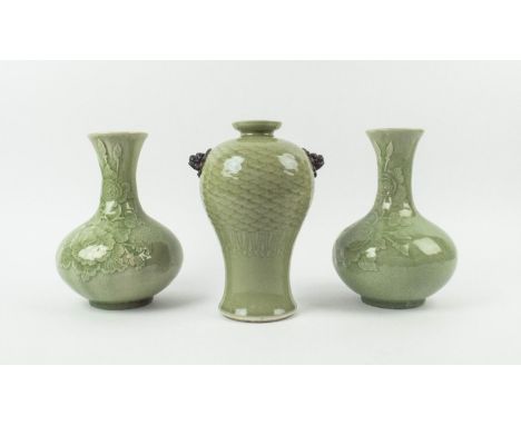 VASES, a pair, green celadon glaze, probably Chinese, of baluster form, craquelure finish, with an embossed rose pattern, ind
