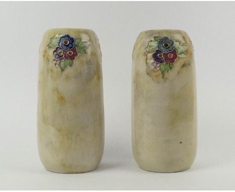 ROYAL DOULTON VASES, a pair, 1929, oblong form, tube lined floral decoration on a mottled ground, each inscribed “With the co