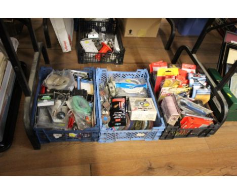 Three boxes of grinding discs, castor cups, metal cables etc