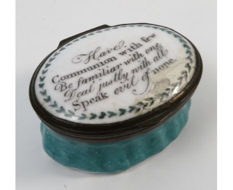 A 19th century Bilston enamel patch box, the lid inscribed 'Have communion with few, be familiar with one, deal justly with a