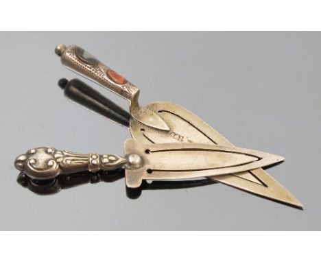 A silver agate set trowel bookmark, by Aide and Lovekin, Birmingham 1889, with hardstones set to the handle, together with an