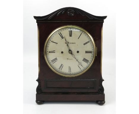 A 19th century mahogany twin fusee bracket clock, the striking movement having a white enamel dial with Roman numerals and in