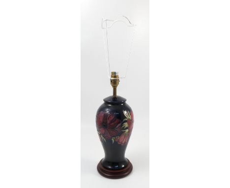 A Moorcroft Pottery lamp base, of baluster form, decorated in the Anemone pattern, on wooden base, height including base but 
