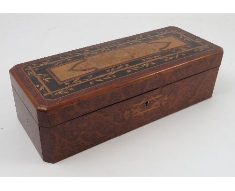 A 19th century French burr wood glove box, the lid and hinged front with inlaid decoration, the lock plate engraved P Sormani