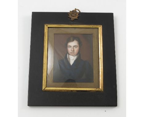 A 19th century rectangular portrait miniature, painted on ivory, of a gentleman wearing a frock coat and white cravat, 4ins x