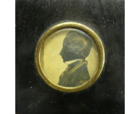 A 19th century portrait silhouette with gilt highlight, inscribed Norcott 1844, diameter 2.25ins, together with four other po