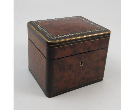 A 19th century French tea caddy, of square form, veneered in a burr wood to the top and sides, framed by mother of pearl and 