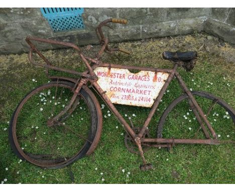 A tradesman bicycle, in very poor condition, fitted with enamel sign, Worcester Garages Ltd