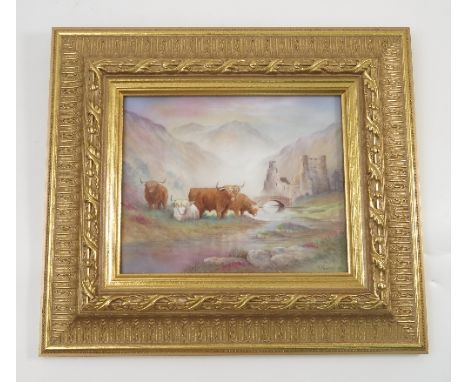 A rectangular porcelain plaque, decorated with highland cattle in a landscape, with castle ruins and bridge beyond, signed M 