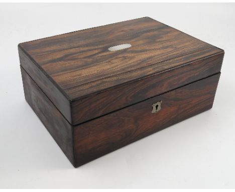 A 19th century coromandal wood box, with mother of pearl plaque to the lid and lied interior, width 12ins