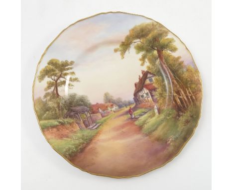 A Royal Worcester cabinet plate, printed painted with a view of Welford on Avon by R Rushton, dated 1930, diameter 10.5ins Co