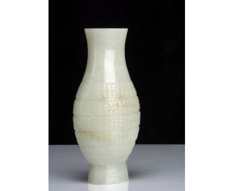 A Far Eastern hardstone vase, A Chinese jadeite jade ovoid carved vase, 28cm 