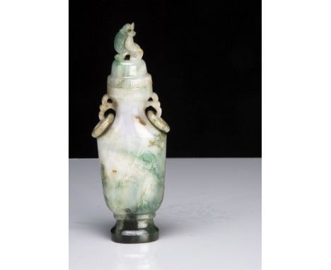 A Chinese jadeite jade carved archaic style vessel and cover, with carved landscape and deer decoration to the body, 19cm hig