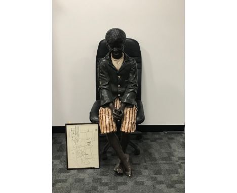 An early 20th century plaster Golds cheider style figure of a young black man and a portrait of the figure by Humphrey Ocean,