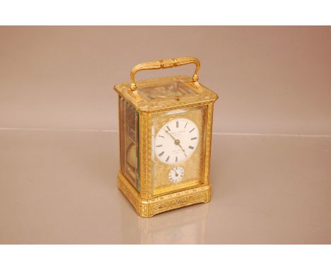 A late 19th century French gilt carriage repeater timepiece, 16cm with handle raised, marked to white enamel dial Bourdin sir