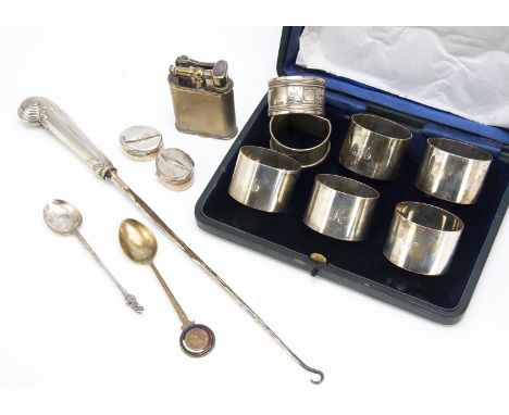 A small group of silver and plate, including a cased set of five silver napkin rings, two British Airways silver pill boxes, 