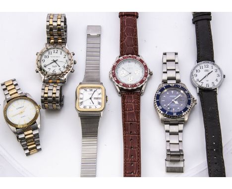 A collection of vintage and modern watches, including an Aqua Master, two Casio watches and more
