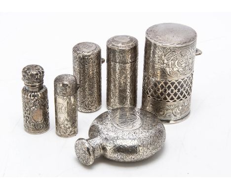 Six Victorian and later silver mounted scent bottles, one flask example, 7cm, the other with hinged topped and glass stoppers