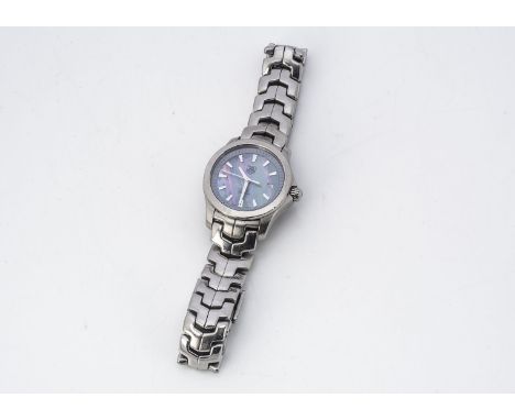 A modern Tag Heuer Link stainless steel lady's wristwatch, 27mm, with mother of pearl dial having date aperture, not running 