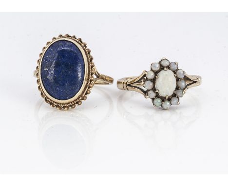 A 9ct gold lapis lazuli oval dress ring, with rope twist setting, ring size R, together with a 9ct gold opal cluster ring, ri