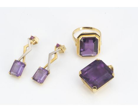 A suite of amethyst jewels, all in yellow metal with continental strike marks and marked 18KT, the step cut gems in claw sett