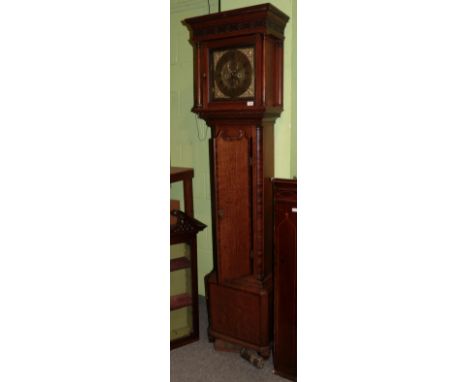 An oak eight day longcase clock with later dial, bearing later inscription Joshua Horrocks, Lancaster .  With pendulum and tw