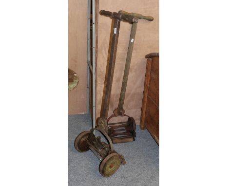 A lawn mower with plaque Followes &amp; Bates patent "Speed-Well"; another lawn mower with plaque stamped "The Leo"; together