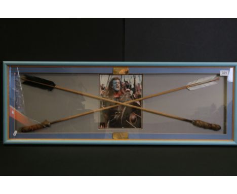 Film Autograph / Props - Mel Gibson, a framed and glazed signed photo with two arrows used in the making of Braveheart, with 