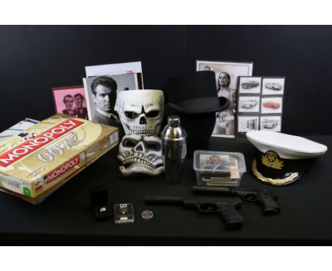 Film Memorabilia - Collection of James Bond related collectables, to include replica guns, hats &amp; masks, Monopoly game, c