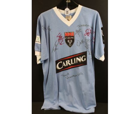 Football Shirt / Autographs - A blue M size NME Carling Cup Charity number 4 shirt, with multiple signatures, to include Emma