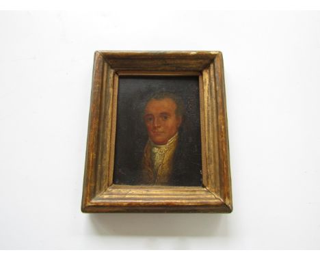 A 19th Century oil on panel portrait of a gentleman