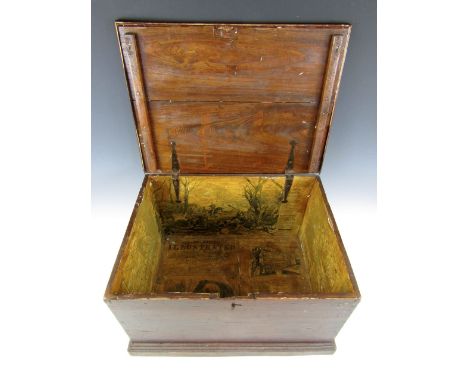 A 19th Century small pine trunk with brass handles