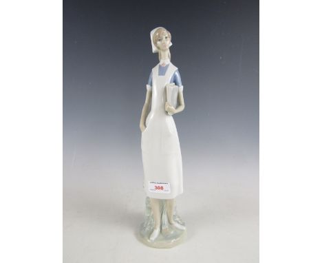 A Lladro figurine entitled The Nurse, 36 cm