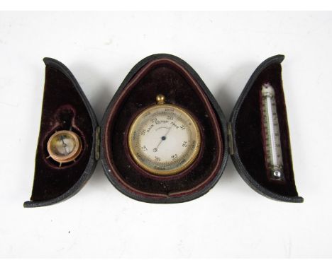 A late 19th Century pocket aneroid barometer (pressure tested as functioning), in original fitted case with integral thermome