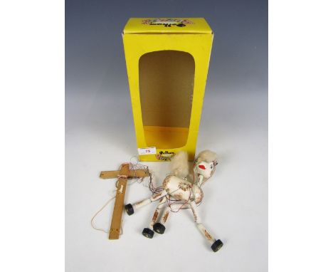 A boxed Pelham puppet of a foal