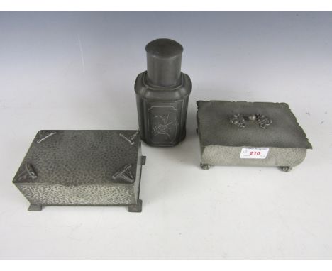 Two 1920s planished pewter cigarette boxes, together with a pewter tea caddy