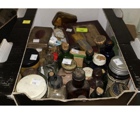 A selection of old medicine bottles etc (sold as collector's items only); a selection of vintage packets etc 