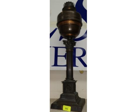 An early 20th century Corinthian column oil lamp in anodised metal 24" 